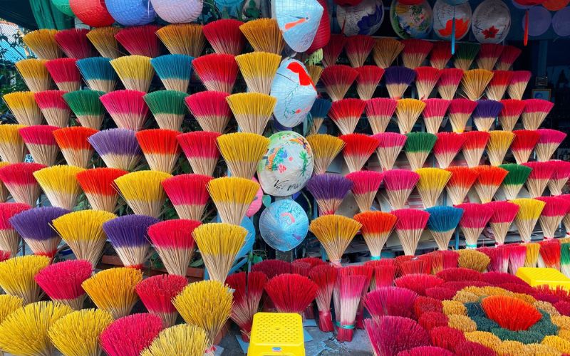 Admire the colorful “dance” of incense sticks