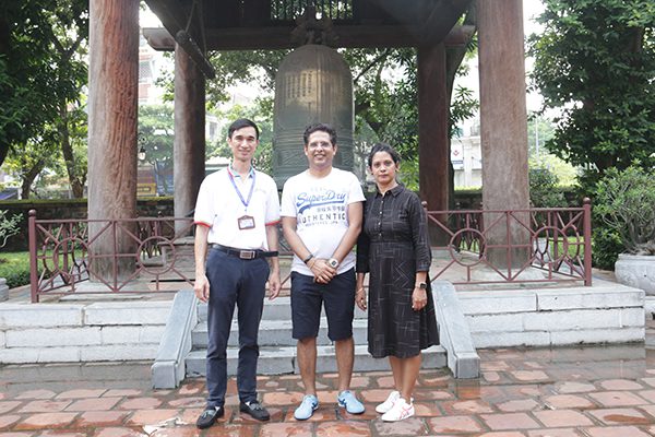 Alex on Hanoi city tour with clients at Temple of Literature