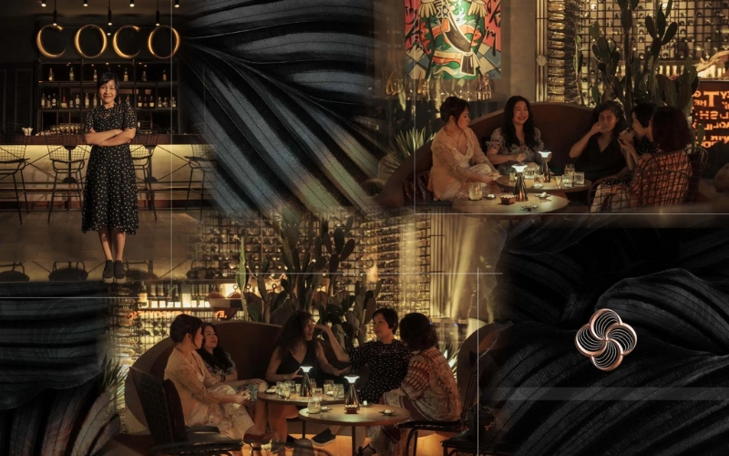 The sophisticated interior of Coco Dining in Ho Chi Minh City, featuring sleek black granite tables, warm lighting, and a minimalist yet intimate dining space, enhances its modern Vietnamese culinary experience