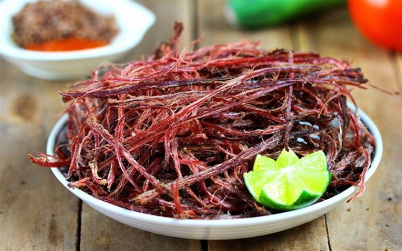 Dried buffalo meat from Sapa, shredded and served with chili salt and lime, a traditional highland snack.