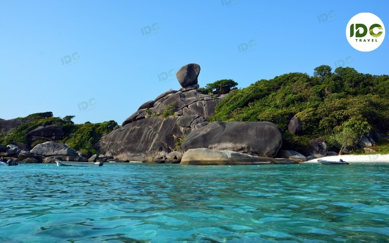 Granite boulders and crystal-clear turquoise water at Donald Duck Bay in the Similan Islands, Thailand.