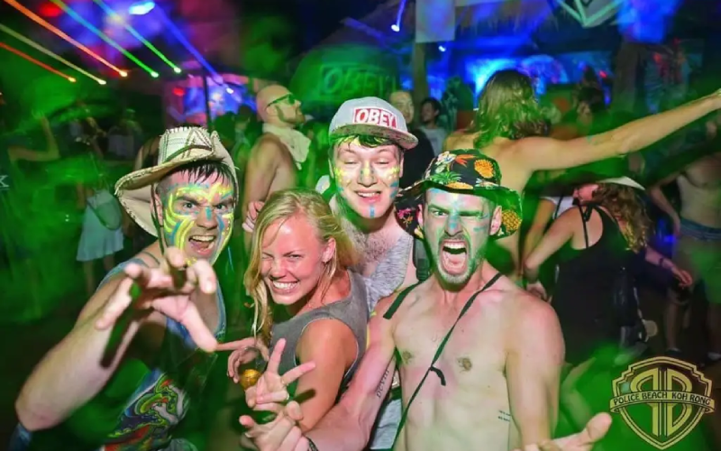 Energetic atmosphere at Fullmoon Party at Police Beach, Koh Rong, Cambodia
