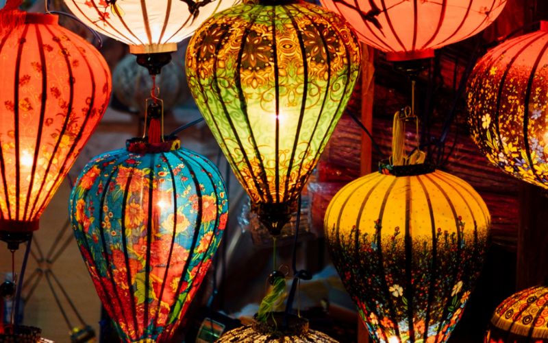Close-up of colorful traditional lanterns in Hoi An, Vietnam, symbolizing local craftsmanship and the town’s vibrant night market