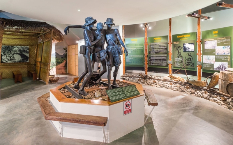 Display of photographs, artifacts, and documents inside the Thai-Burma Railway Centre, telling the story of the WWII Death Railway.