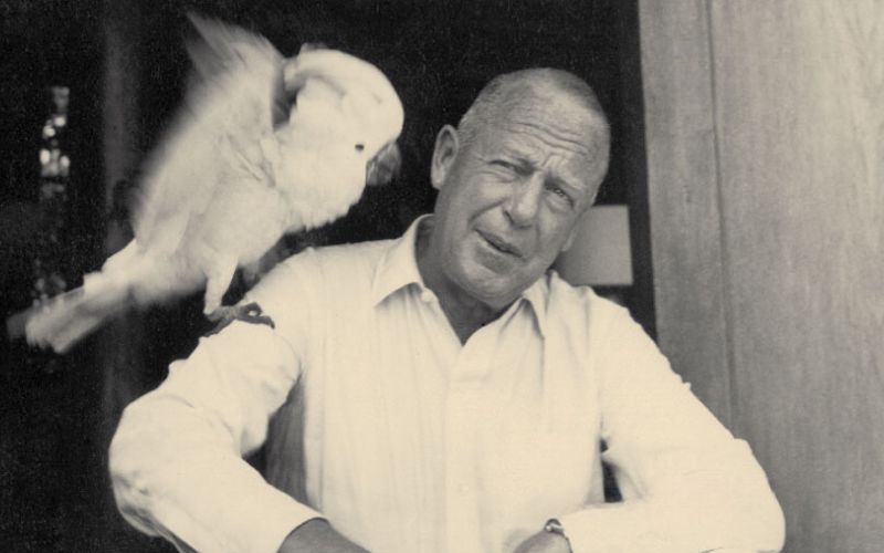 Jim Thompson with his frequent companion, Cockatoo