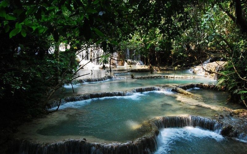 Kuang Si waterfall - a three-tiered waterfall about 29 kilometers (18 mi) south of Luang Prabang