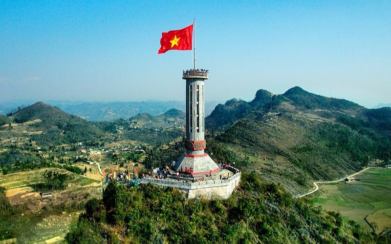 Lung Cu Flag Tower on the Ha Giang Loop, marking Vietnam’s northernmost point with panoramic mountain views