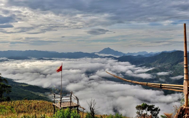 Valley view of Mai Chau covered in morning clouds and surrounded by mountain ranges