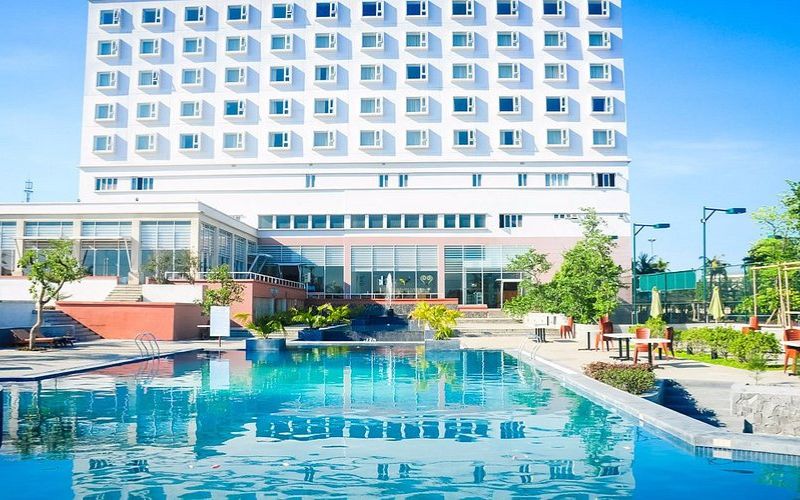 Saigon Dong Ha Hotel in Quang Tri, Vietnam, featuring a modern building with outdoor swimming pool