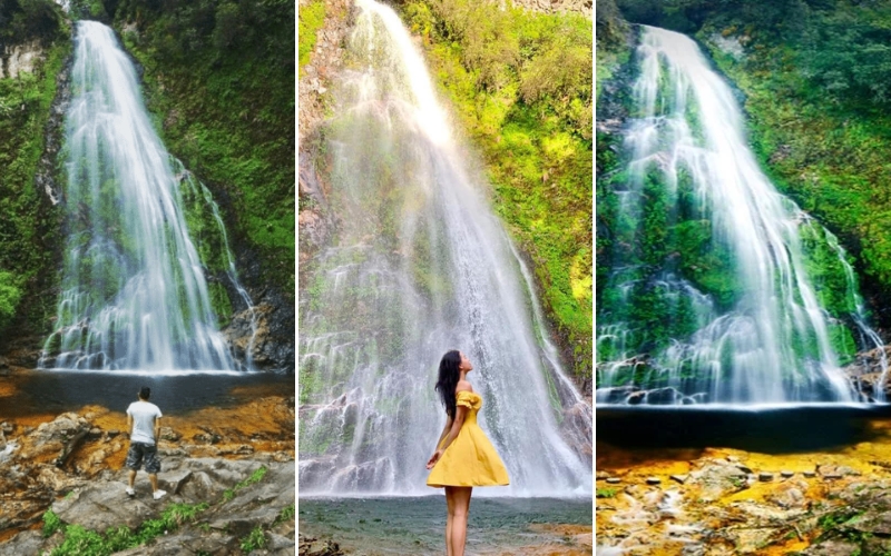 Love Waterfall in Sapa flowing gracefully down a mossy cliff, with visitors admiring its beauty amidst a tranquil, forested landscape.
