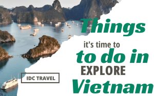 Cruise boats sailing among limestone karsts in Halong Bay, Vietnam, with text overlay reading “Things to do in Vietnam” and the IDC Travel logo.