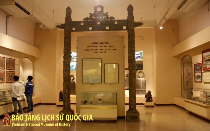 An exhibit featuring royal robes, court items, and historical documents from the Nguyen Dynasty and the French colonial era.