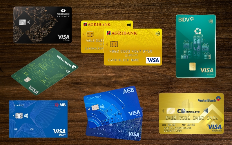 Collection of Visa debit and credit cards from Vietnamese banks including Vietcombank, Agribank, BIDV, MB, ACB, VietinBank, and Techcombank.