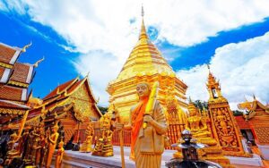 Doi Suthep Temple in Chiang Mai, featuring exquisite temple architecture against a clear blue sky