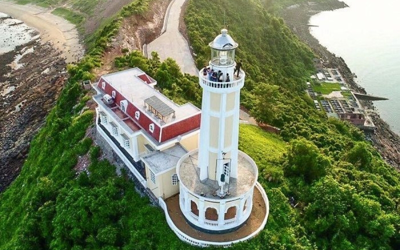 Panoramic view from Vung Tau Lighthouse, with sweeping vistas of the coastline and fishing boats at sea.