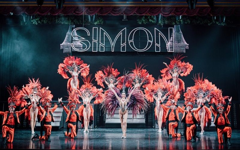 Beautiful dancers in charming costumes at Simon Cabaret Show, the most popular entertaining show in Phuket, Thailand